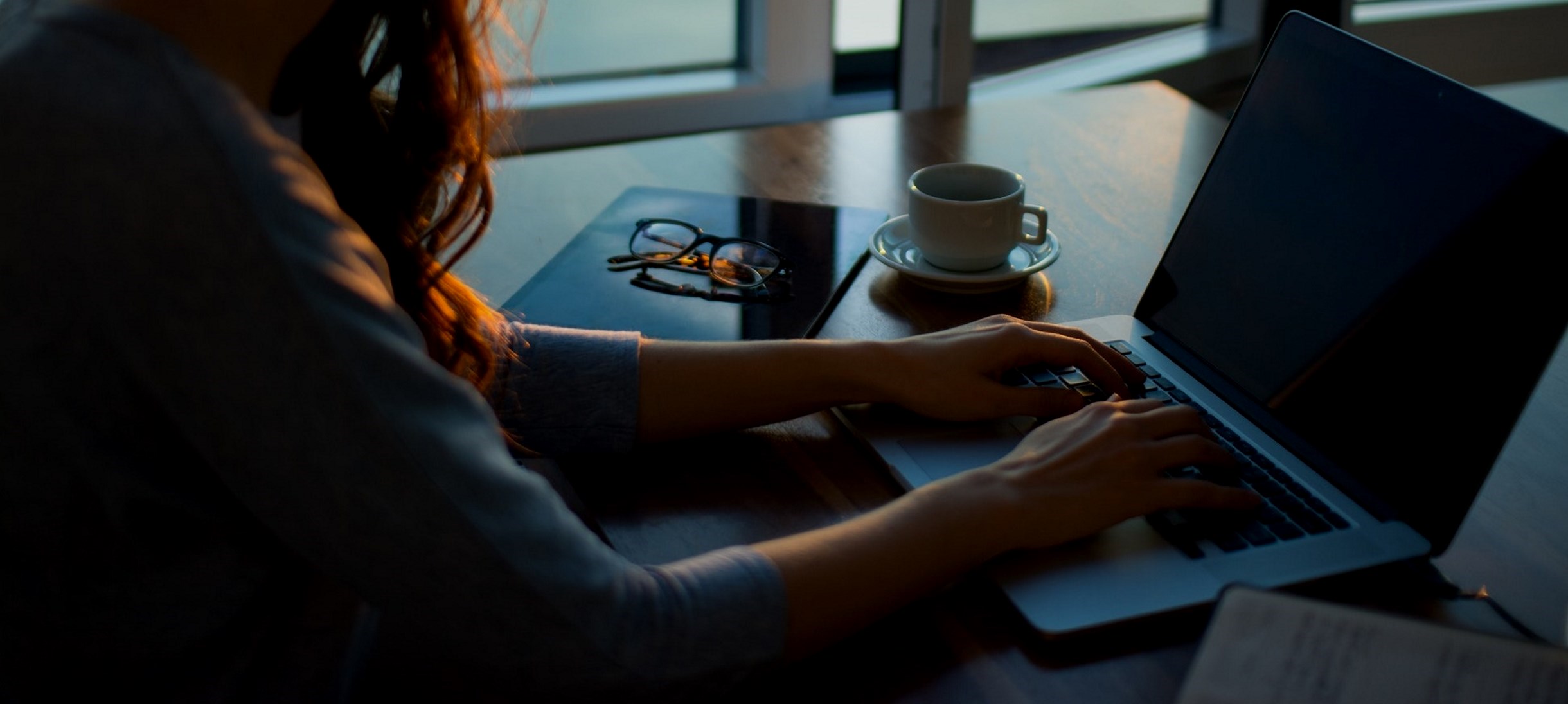 Woman working on a laptop