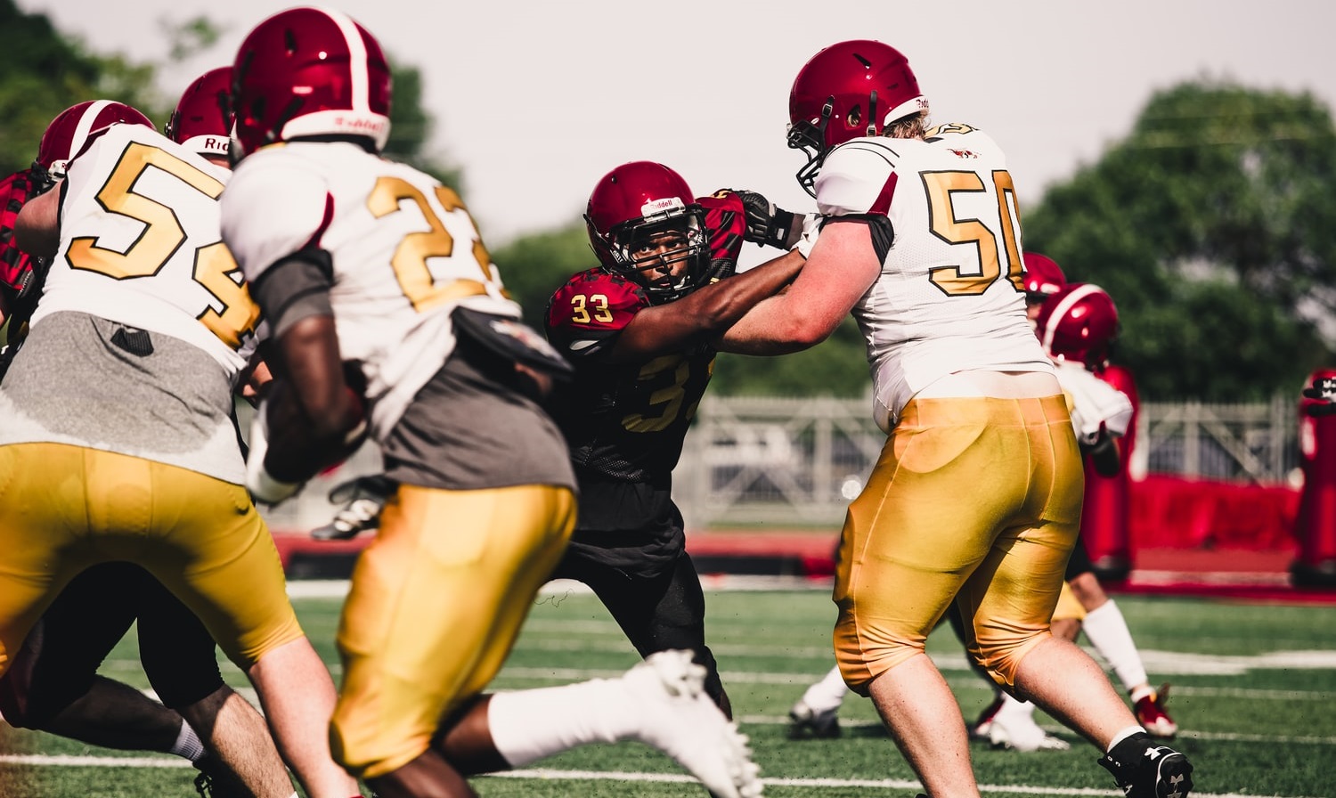 American football players in action on the field.