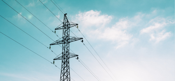 Power pole against a blue sky