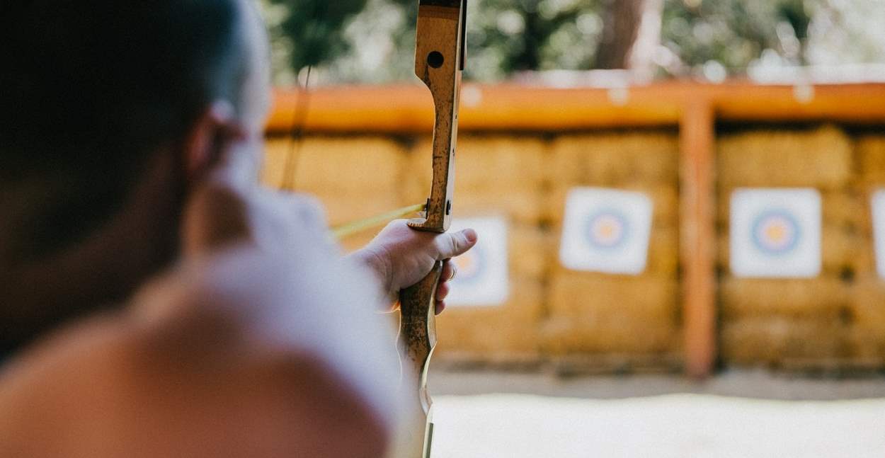 An archer aiming at targets