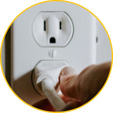 Image of pulling a plug from a wall socket