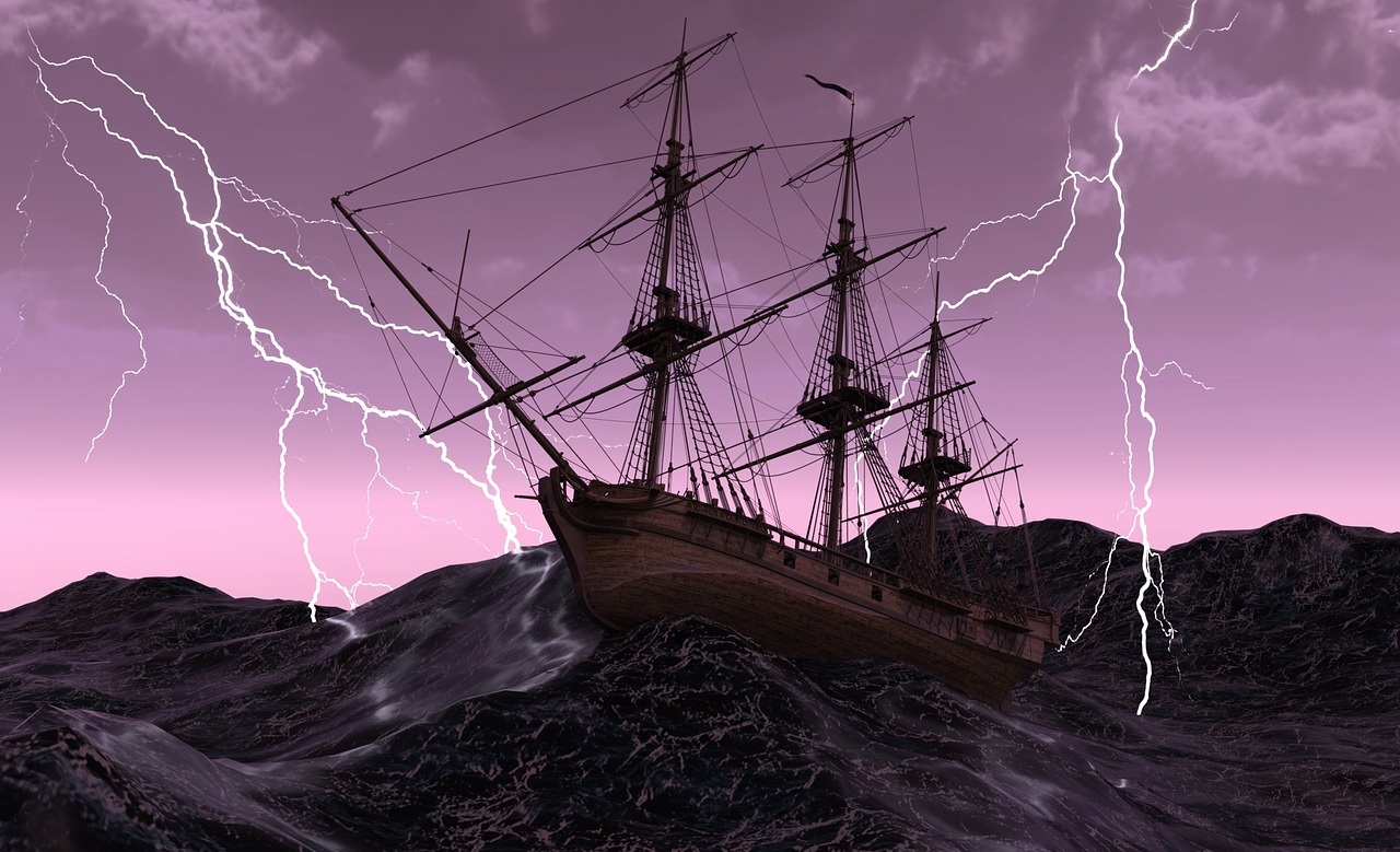 A large ship navigating through a stormy sea.