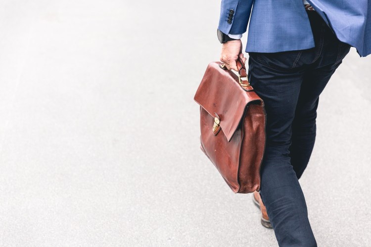 Man with a leather briefcase