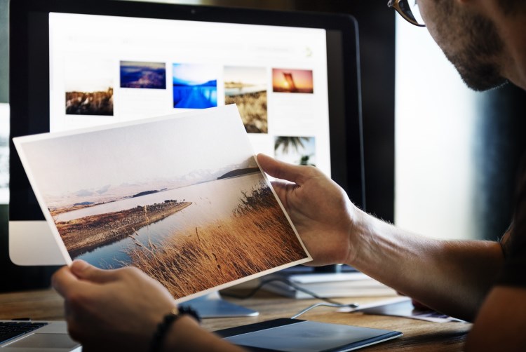 Man printing out photos